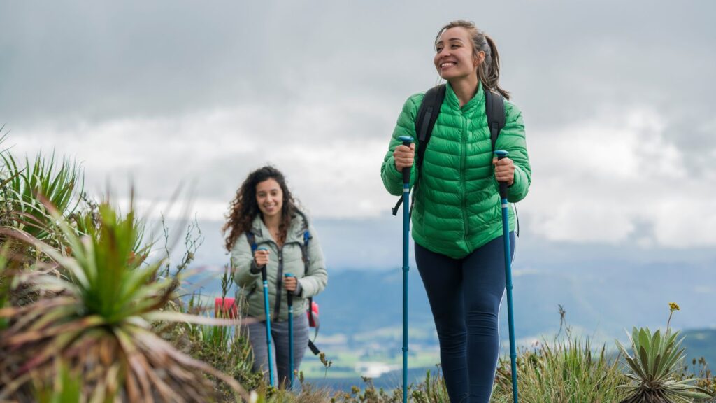 Happy-women-hiking-mountain