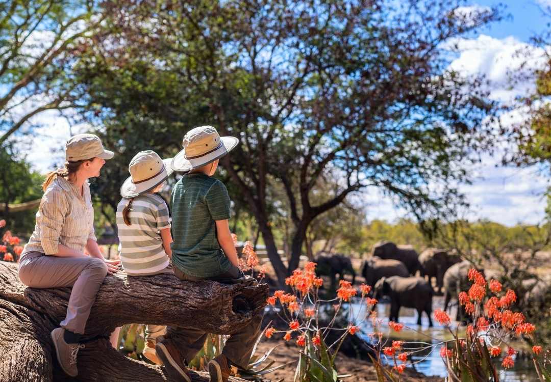 Family wearing safari hats for sun protection in Tanzania